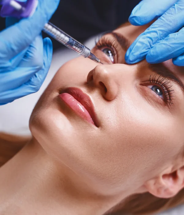 young-pretty-woman-is-preventing-age-by-visiting-cosmetologist-getting-botox-injections-into-face
